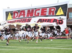 Thompson takes the field before its 49–0 victory over Vestavia Hills in 2026. Photo: Thompson High School Athletics